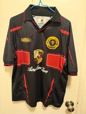 Amie Leon sore Black & Red Racing Polo Shirt